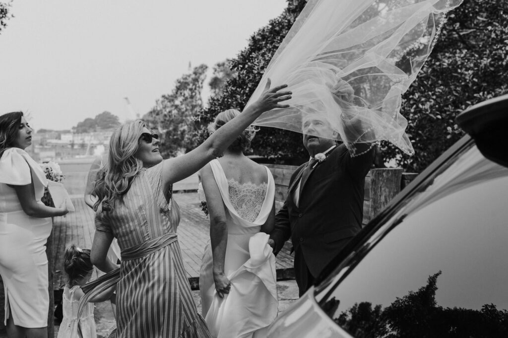 woman holding bride veil at balmain wedding