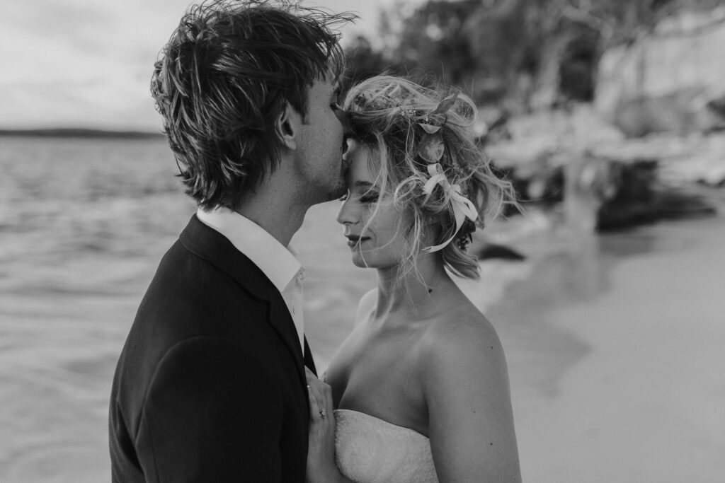 bride and groom wategos beach wedding
