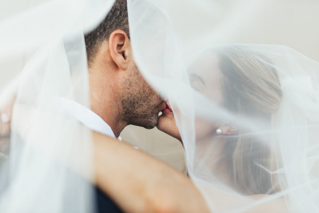 bride and groom kissing ripples chowder bay wedding