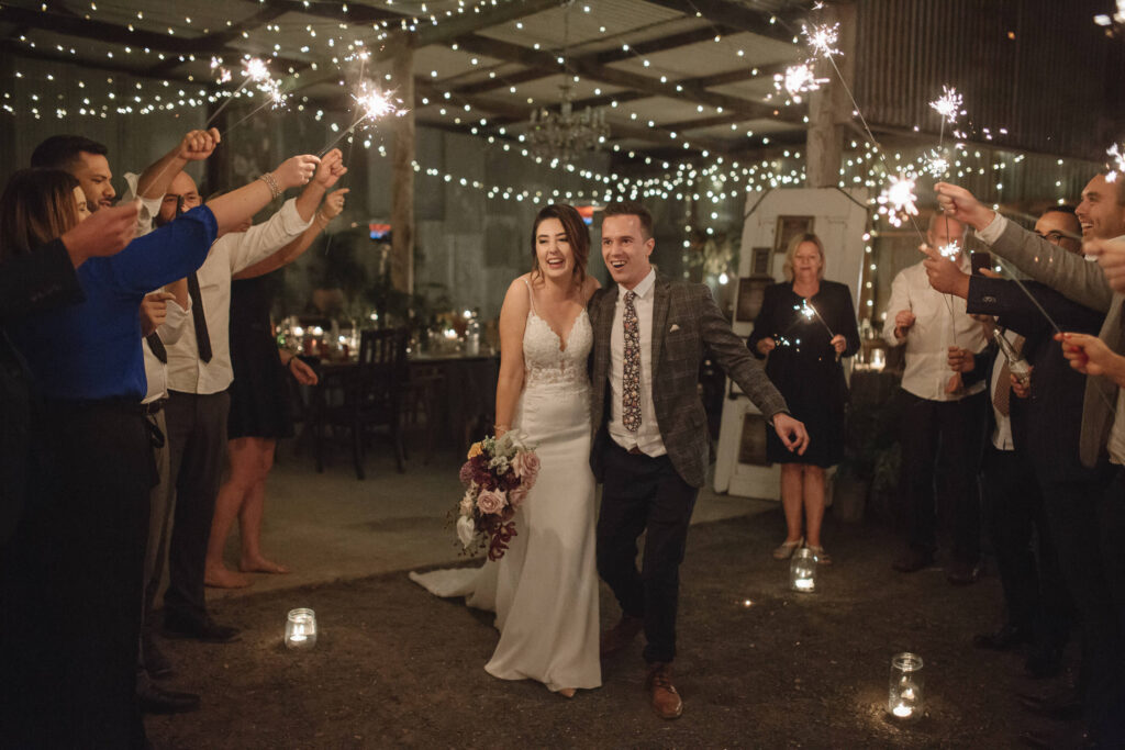 bride and groom sparkler exit at byron bay hinterland wedding