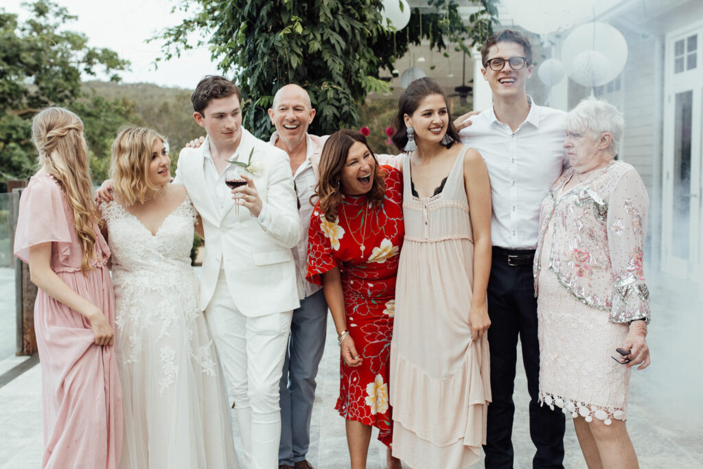 candid family wedding photo at byron bay wedding