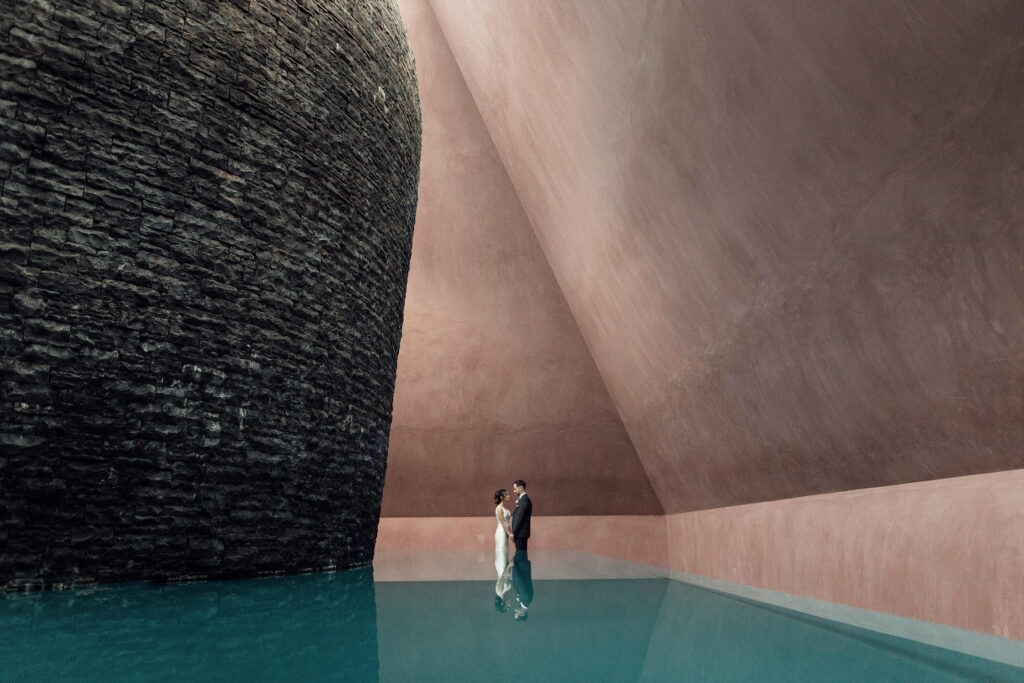 bride and groom standing at the james turell installation Canberra