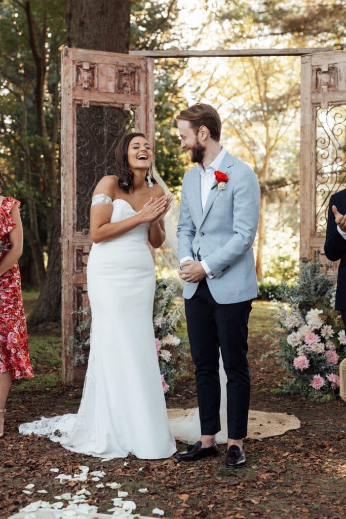 bride and groom laughing at montrose house