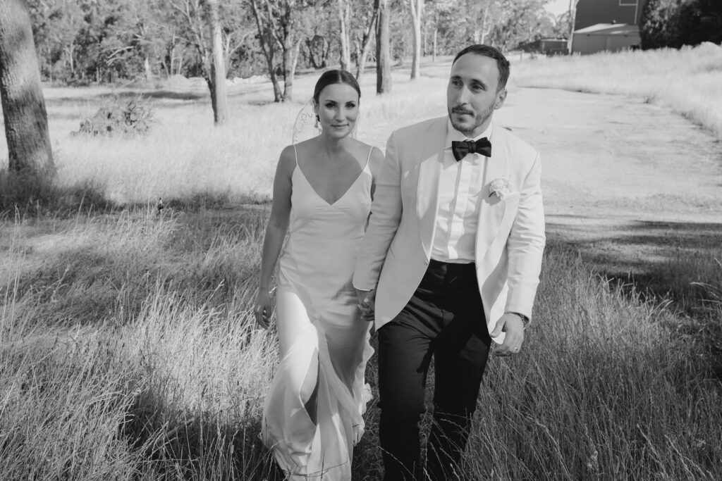 bride and groom walking in bowral weddng