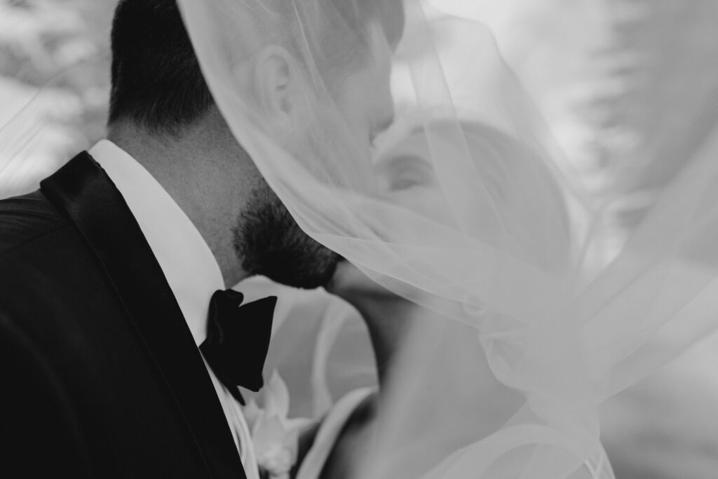bride and groom kissing palm beach wedding
