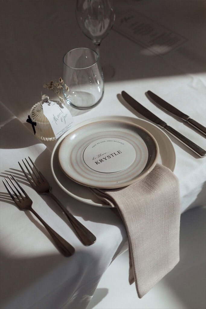 Sydney wedding photography - close-up of a beautifully set table with a name card and glassware.